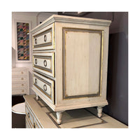 French Provincial nightstand on display, angled side view.