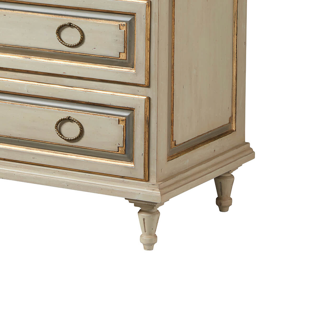 Detailed view of nightstand legs and bottom drawer.