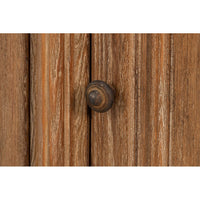 Close-up of sideboard cabinet knob detail.