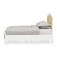 Side view of French Provincial queen bed.