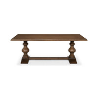 Front view of wooden refectory dining table.