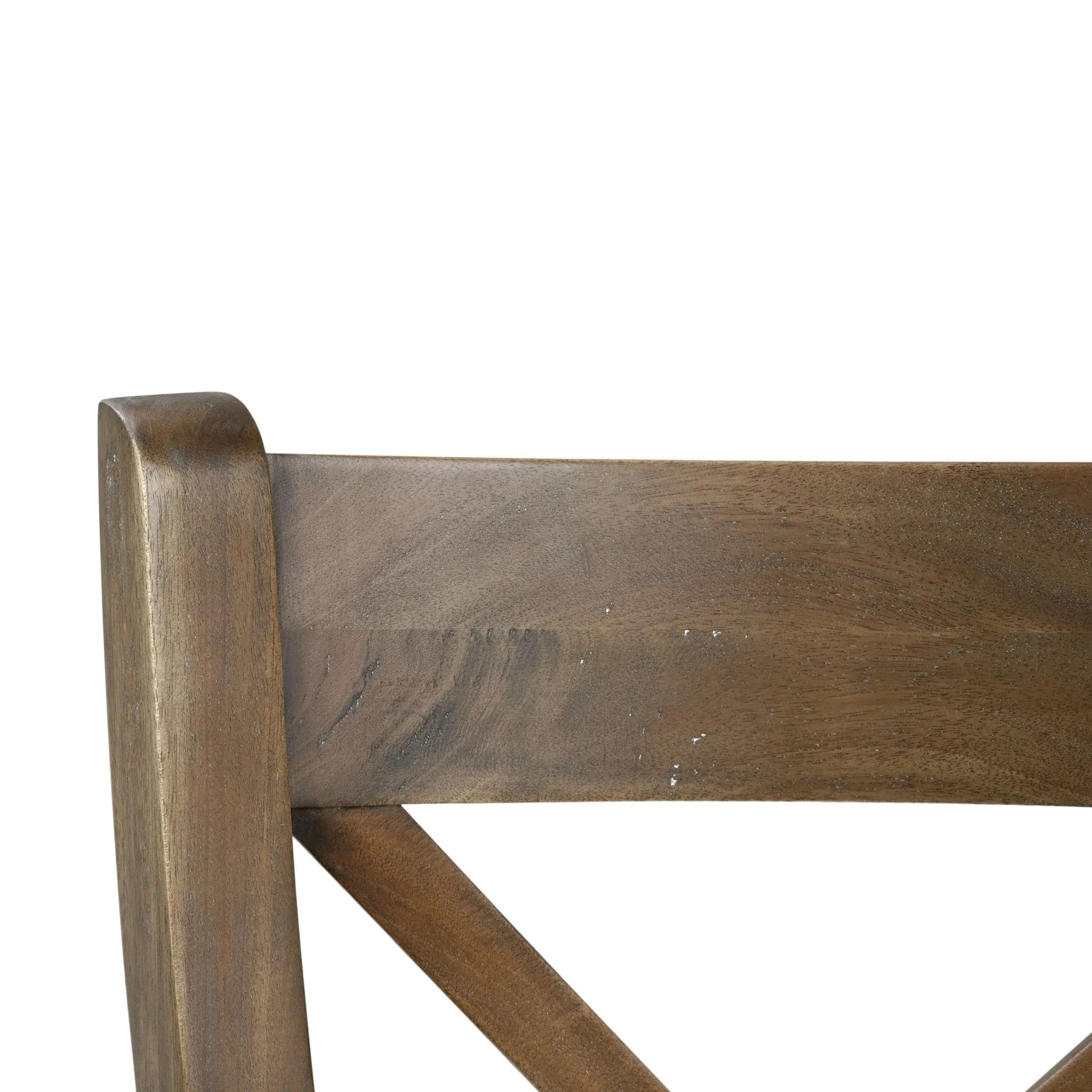 Close-up of rustic dining chair wooden backrest.
