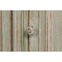 Close-up of knob detail on sideboard.