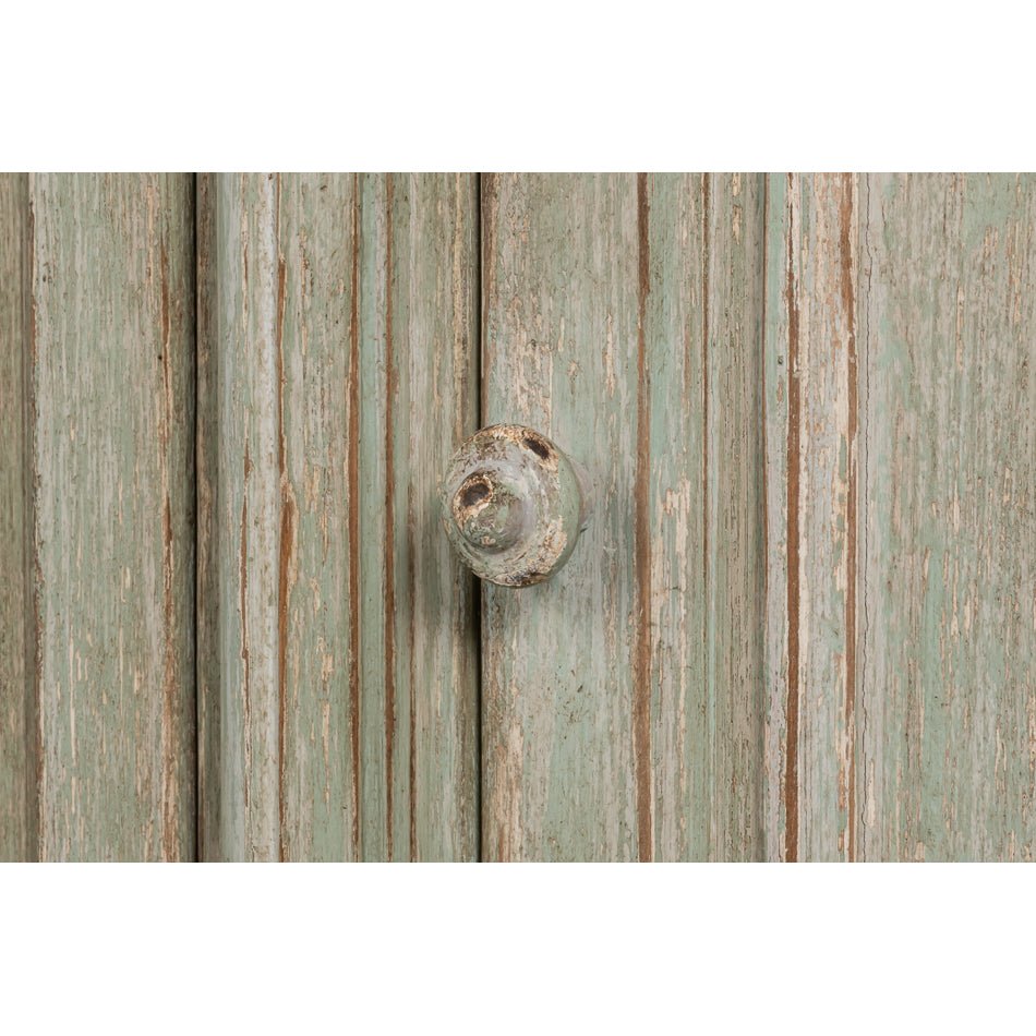 Close-up of knob detail on sideboard.