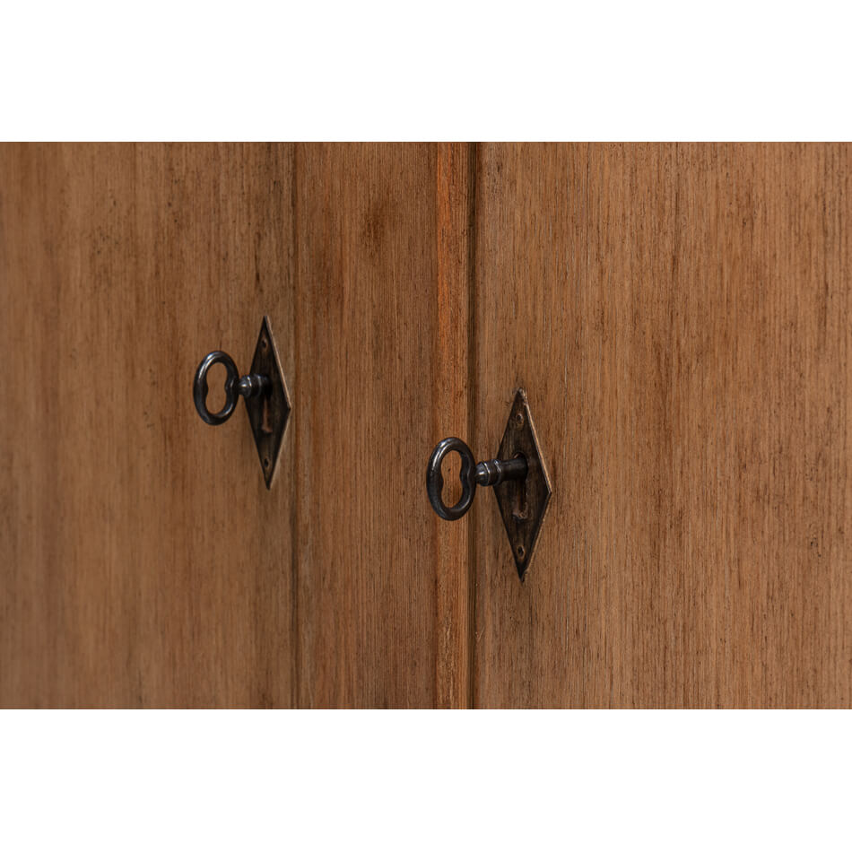 Keyhole detail on French Provincial sideboard doors.