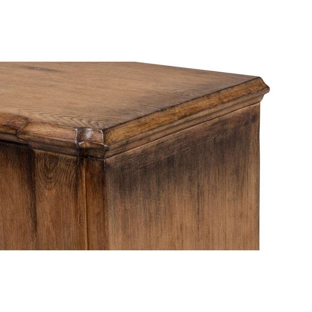 Corner detail on French Provincial sideboard with rustic finish.