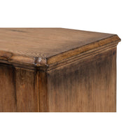 Corner detail on French Provincial sideboard with rustic finish.