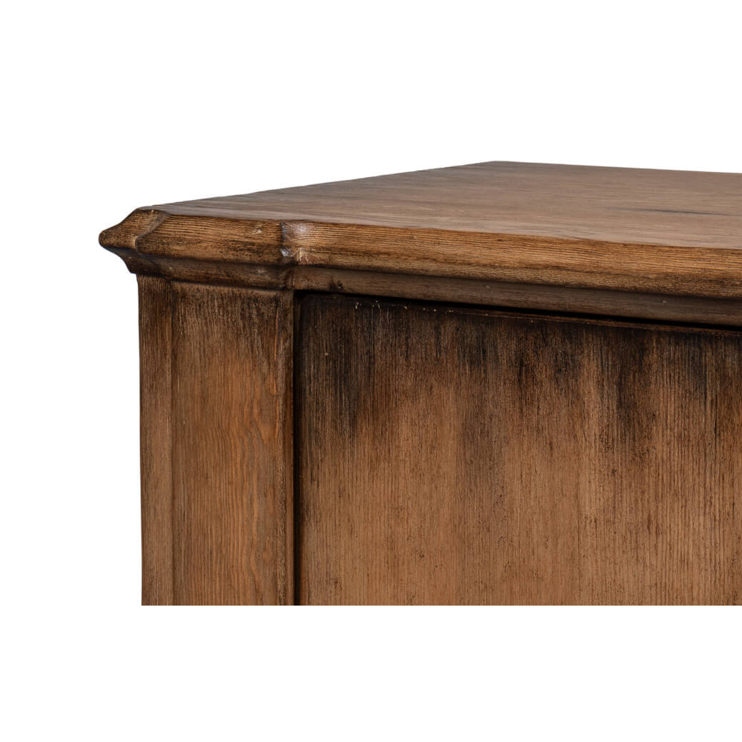 Detailed view of French Provincial sideboard corner design.