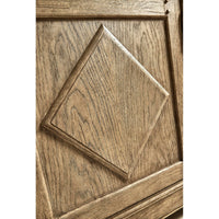 Close-up of sideboard door with diamond pattern.
