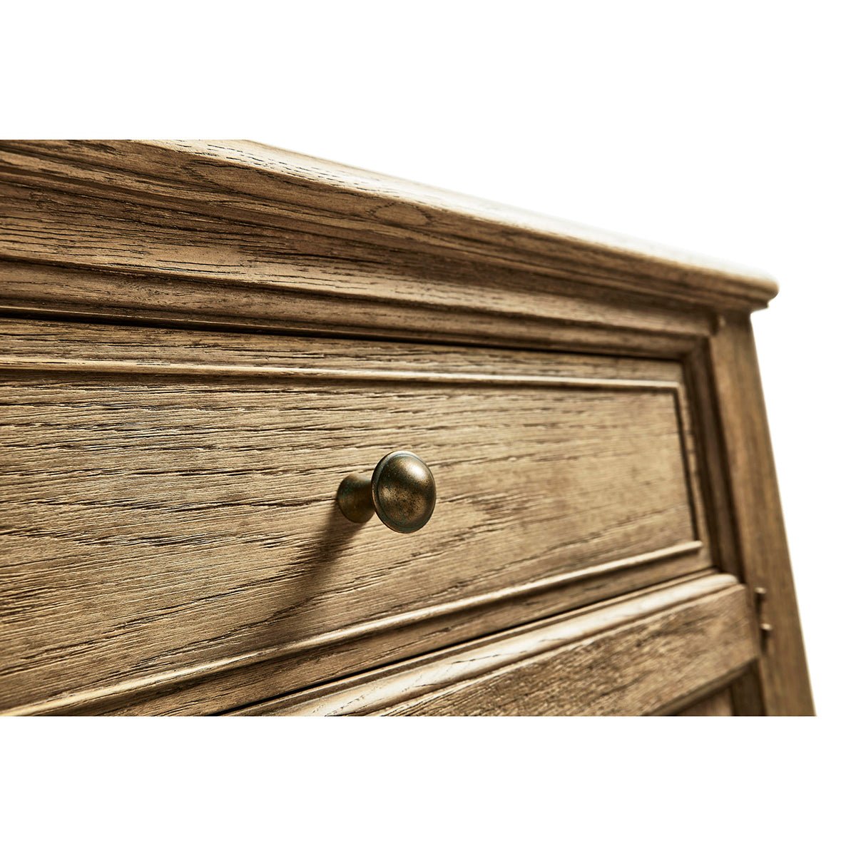 Close-up of sideboard drawer knob detail.