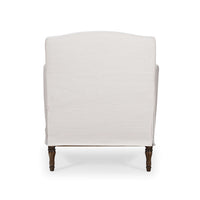 Back view of white armchair with slipcover.