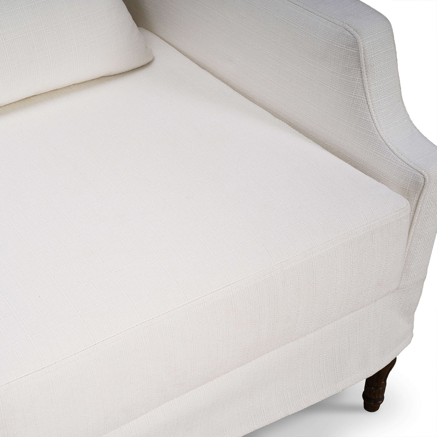 Armchair seat view, showing cushion and slipcover detail.