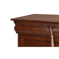 Detailed corner of French provincial sideboard with tassel