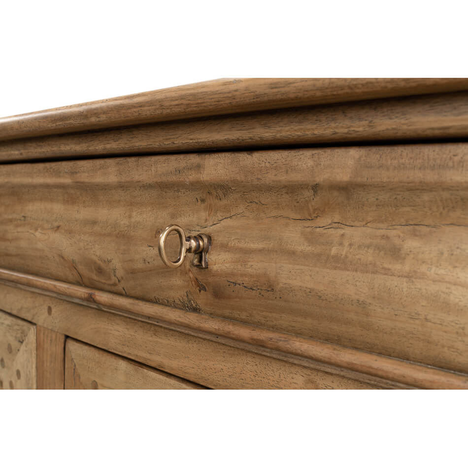 Keyhole detail on French provincial sideboard.
