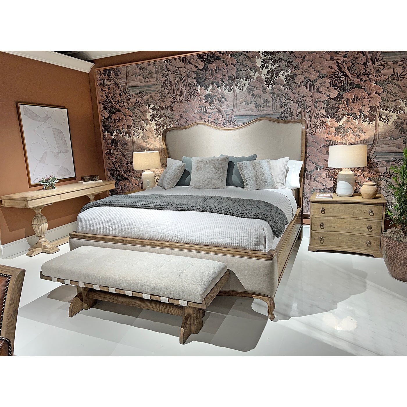 French Provincial bed styled in a decorated bedroom.