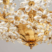 Detailed base view of French Rococo chandelier decor.