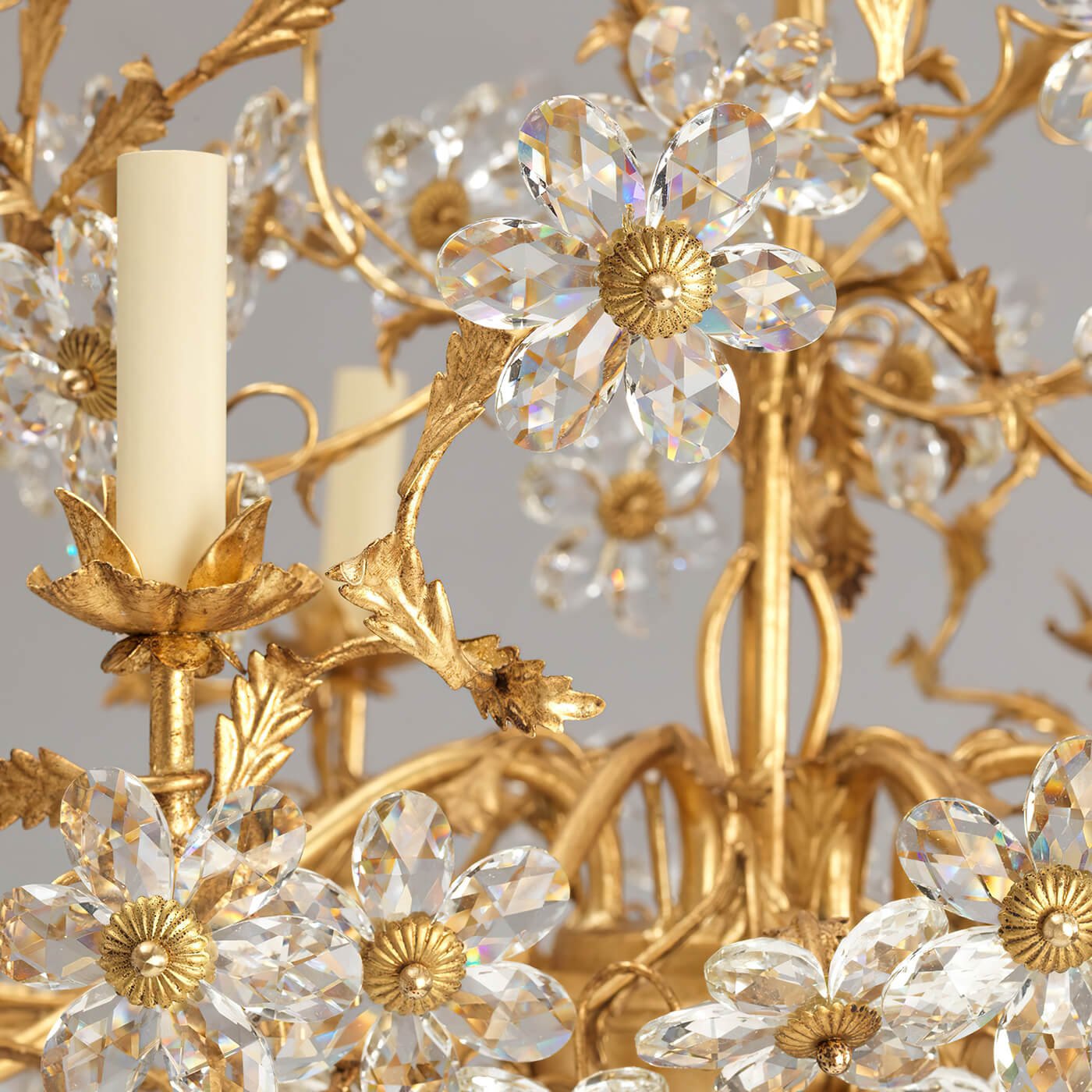 Close-up of crystal flowers on Rococo chandelier.