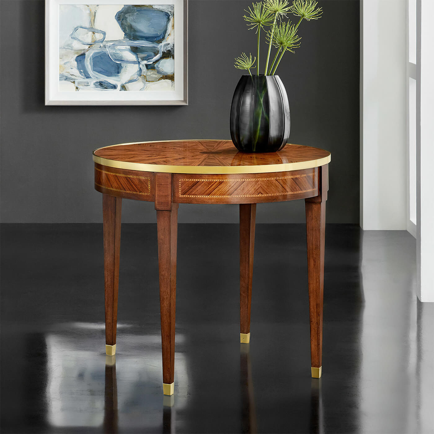 Parquetry side table in modern living room with vase.