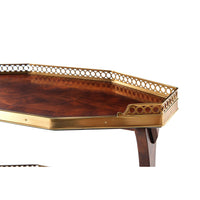 Close-up of table's brass edging and wood finish.