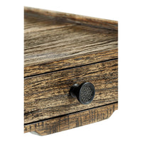 Close-up of lamp table's drawer knob detail.