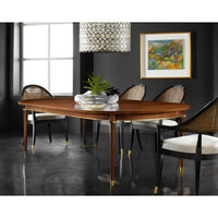 French walnut dining table in stylish dining room setting.