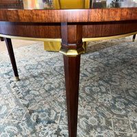 Decorative leg detail on French walnut dining table.