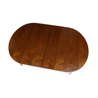 Top view of oval French walnut dining table.
