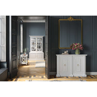 Room interior with display cabinet, artistic decor.