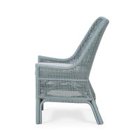 Frosted blue rattan dining chair side view.