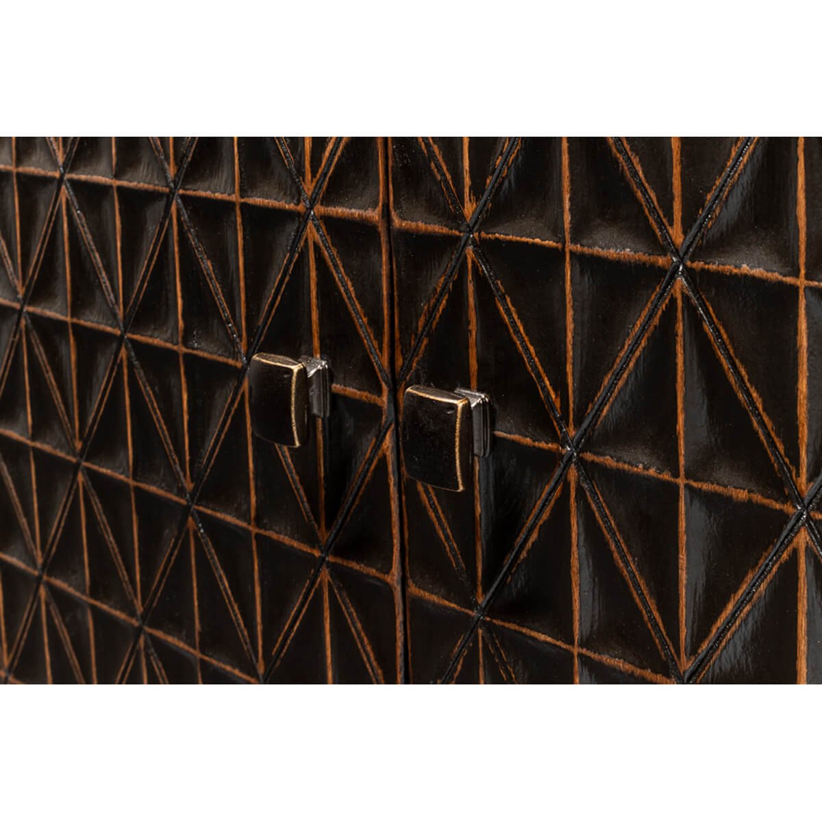 Close-up of handles on geometric credenza.
