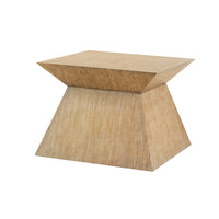 Single geometric pedestal coffee table, angled view.