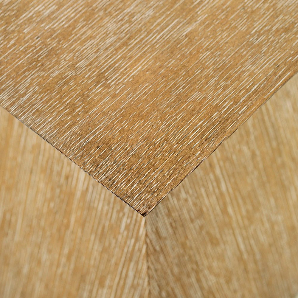 Close-up, textured surface of coffee table.