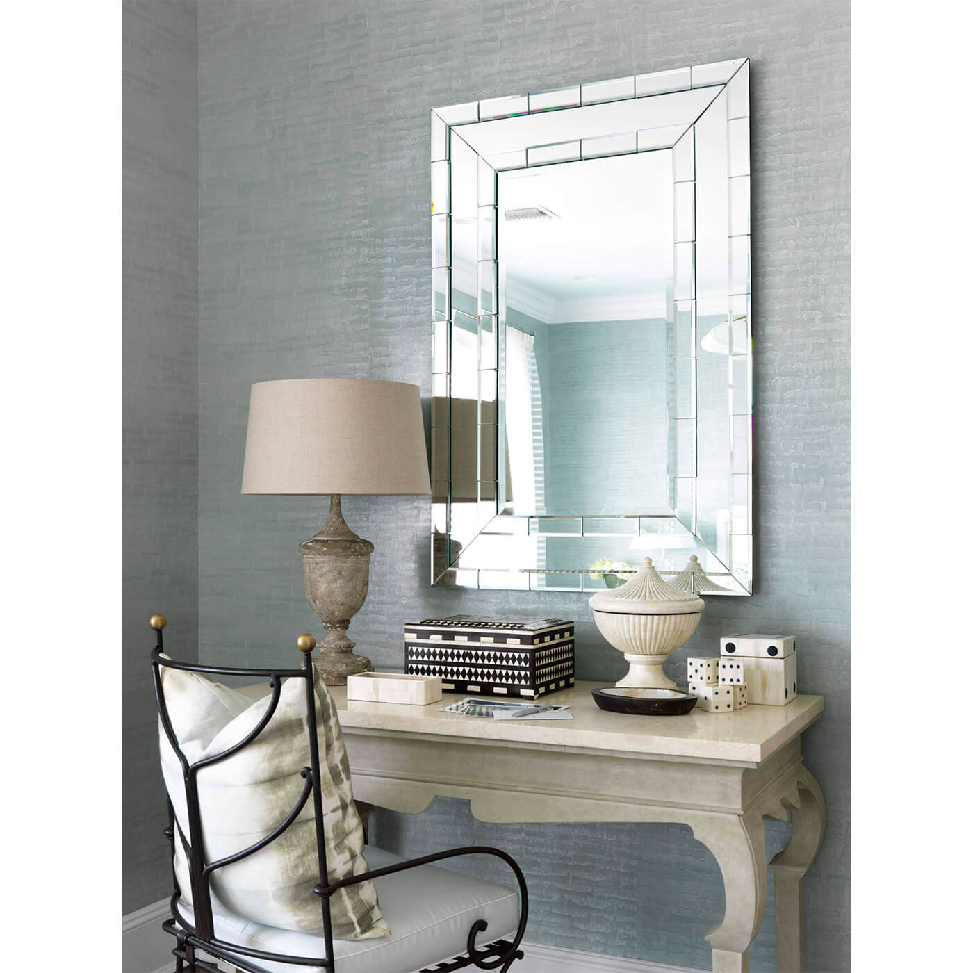 Hall table used as desk with decor accessories.