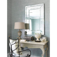 Hall table used as desk with decor accessories.