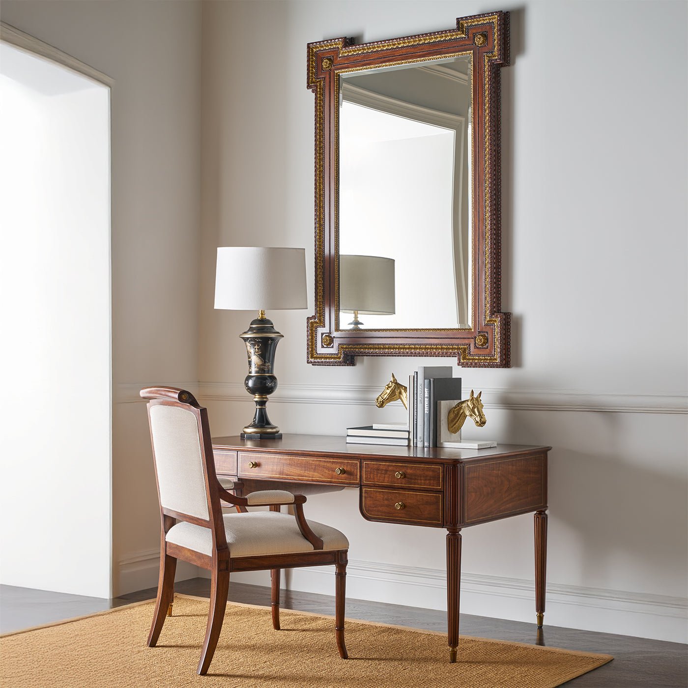 George II mirror in elegant home office setting.