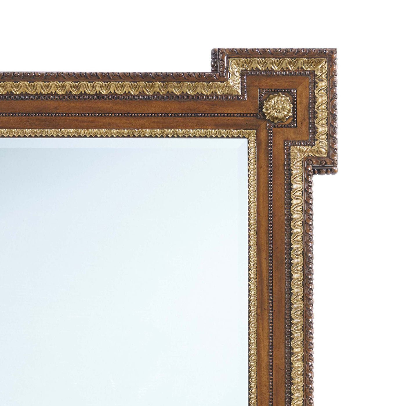 Detailed corner design of George II antique style mirror.
