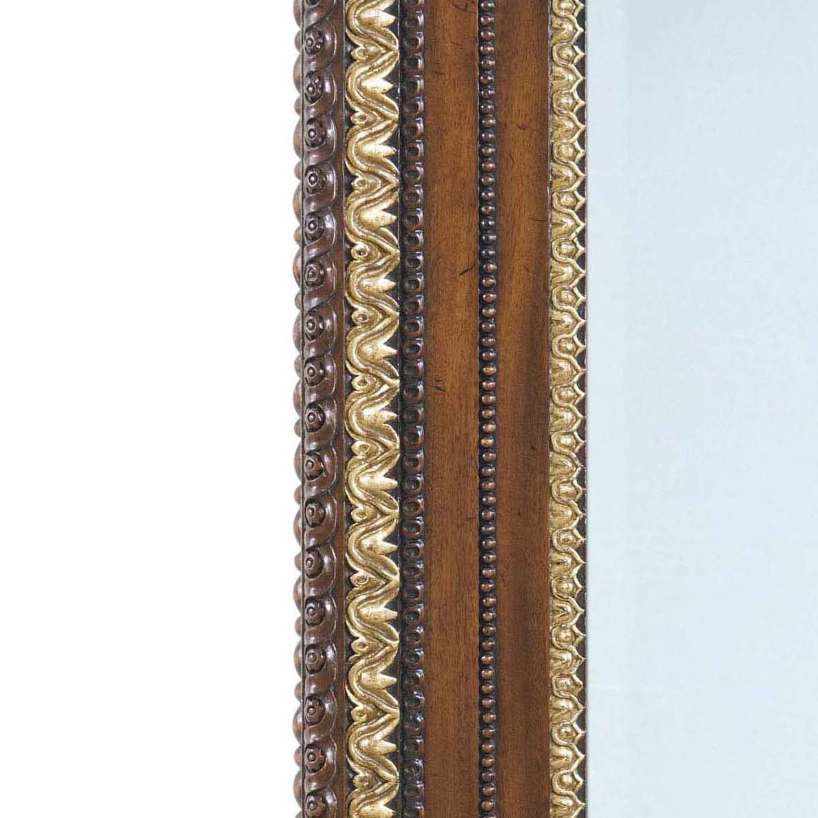 Close-up of intricate George II mirror border design.