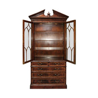Open George II mahogany bookcase showing empty shelves.