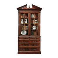 George II bookcase holding books and decorative items.