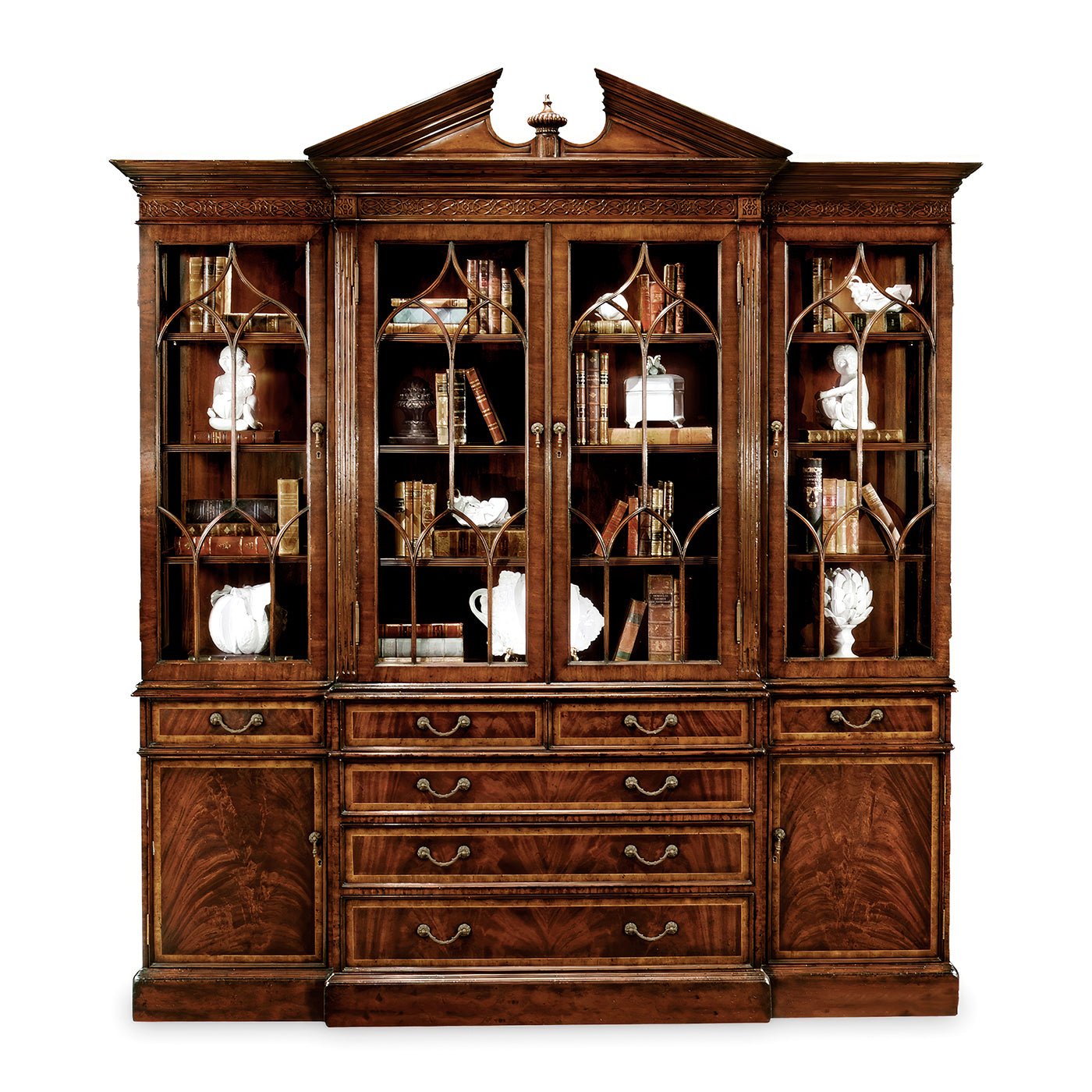 George II bookcase filled with books and decor pieces.