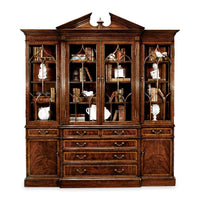George II bookcase filled with books and decor pieces.