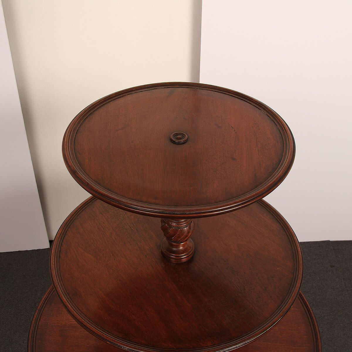 Top tier of mahogany dumbwaiter from above.