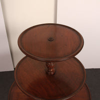 Top tier of mahogany dumbwaiter from above.