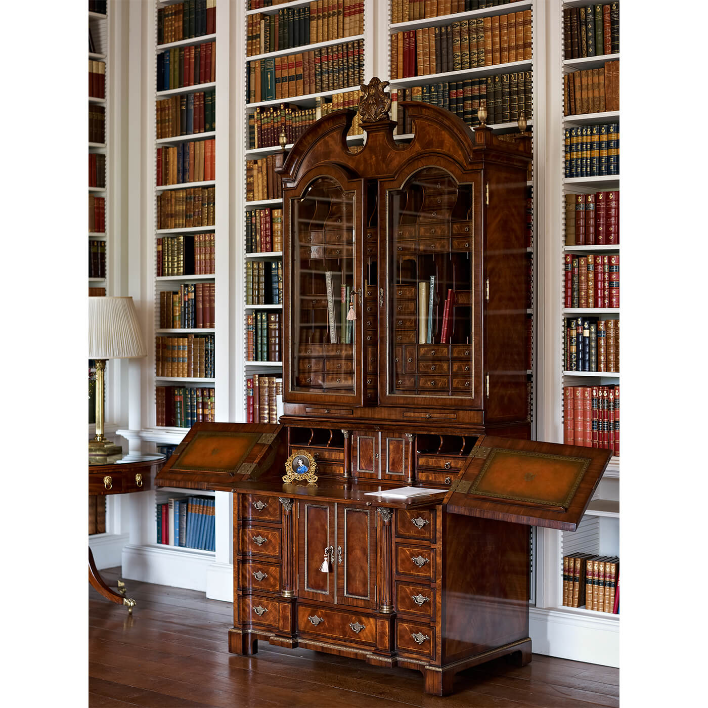 Bookcase in library setting with open compartments.