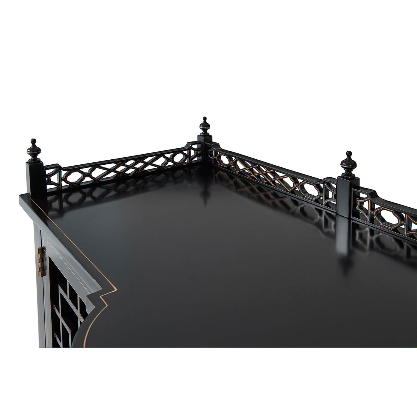 Chippendale sideboard top corner showing ornate railing