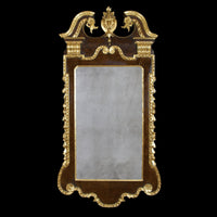 George II mirror on black background, gold detailing.