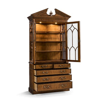 Open walnut bookcase with lighting on shelves.