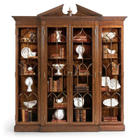 Walnut display bookcase filled with decorative items.