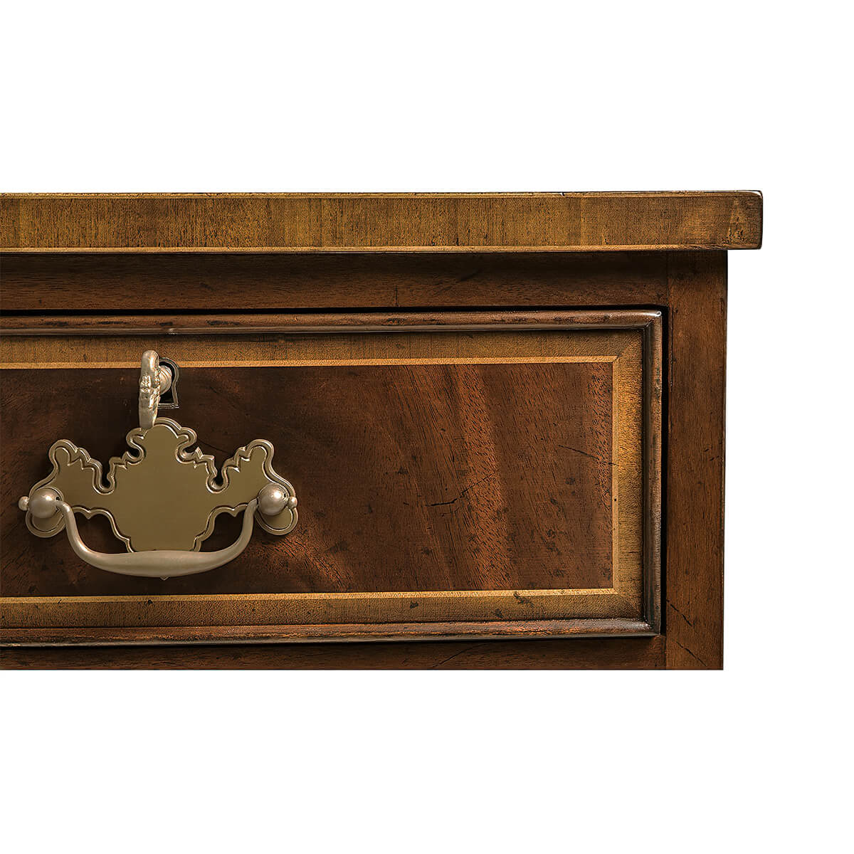 Close-up of dresser drawer handle detail.