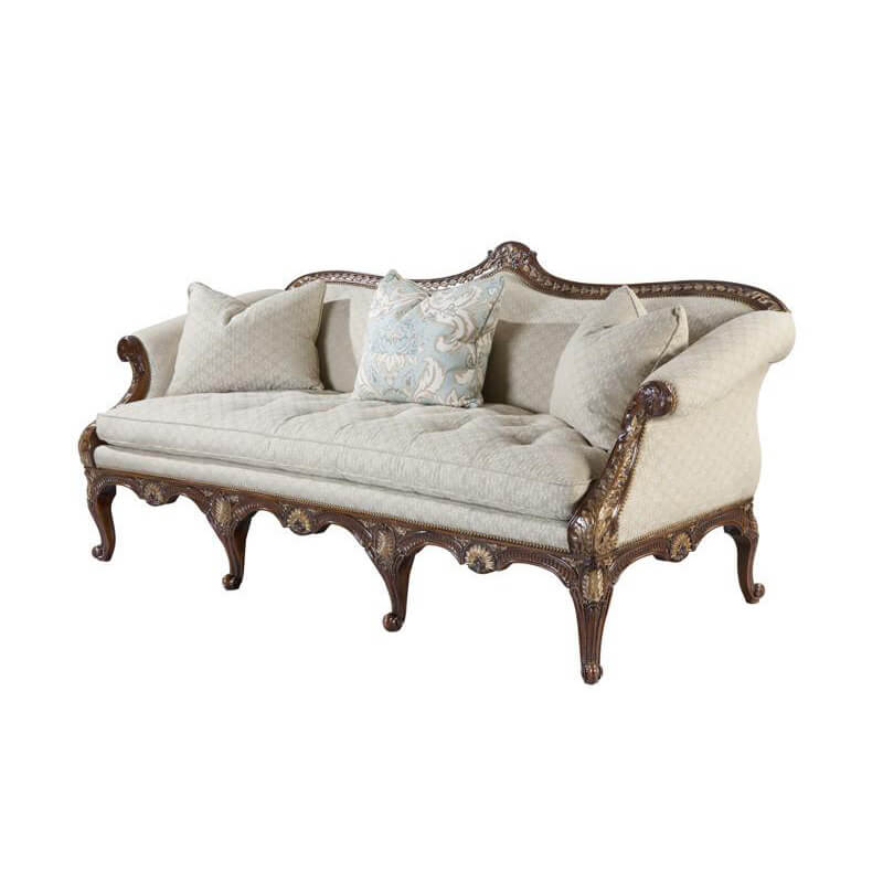 Elegant George III Chippendale sofa with ornate wood details.